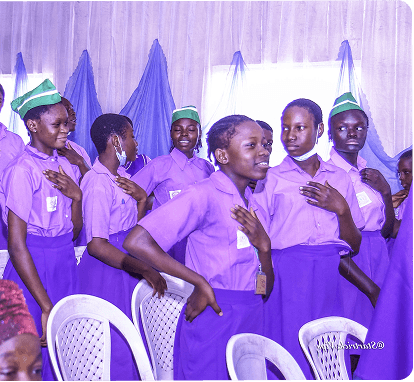 Staff in purple uniforms